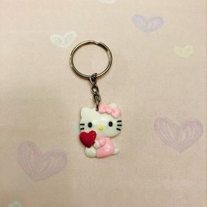 Pink Hello Kitty keychain with red heart